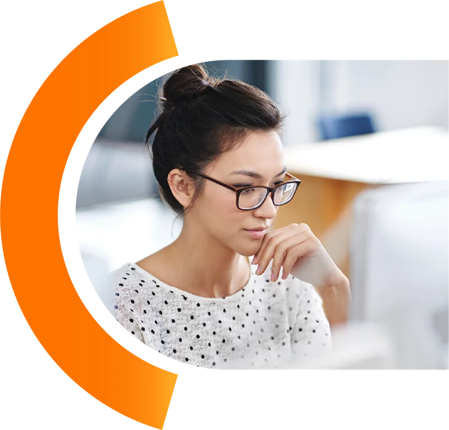 A health information professional at a workstation