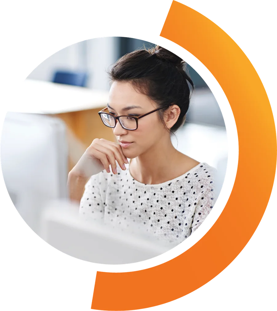 A health information professional at a workstation